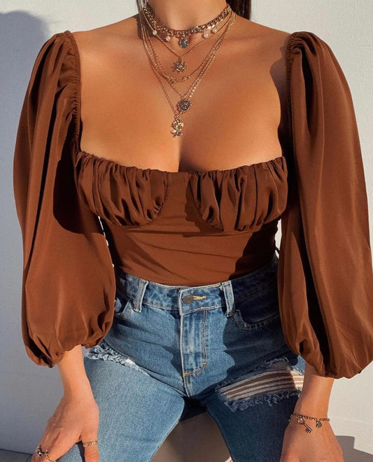 Camiseta de manga larga con escote en el pecho para mujer