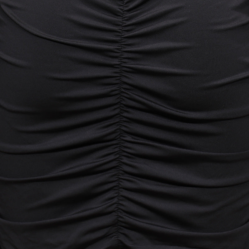 Vestido ajustado de manga larga con tirantes calados