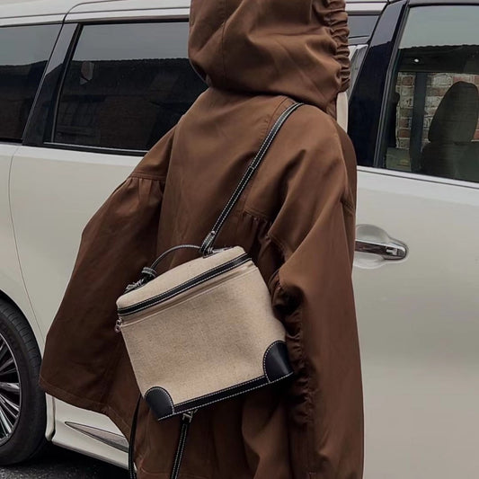 Chaqueta con capucha holgada y versátil de longitud media para mujer