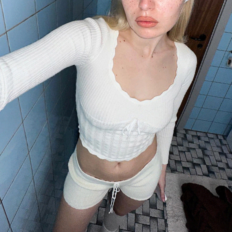 Top de lana con lazo y flor de gancho