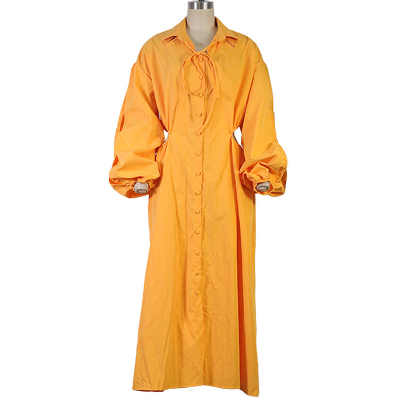 Vestido largo con cuello vuelto y cordones de diseño