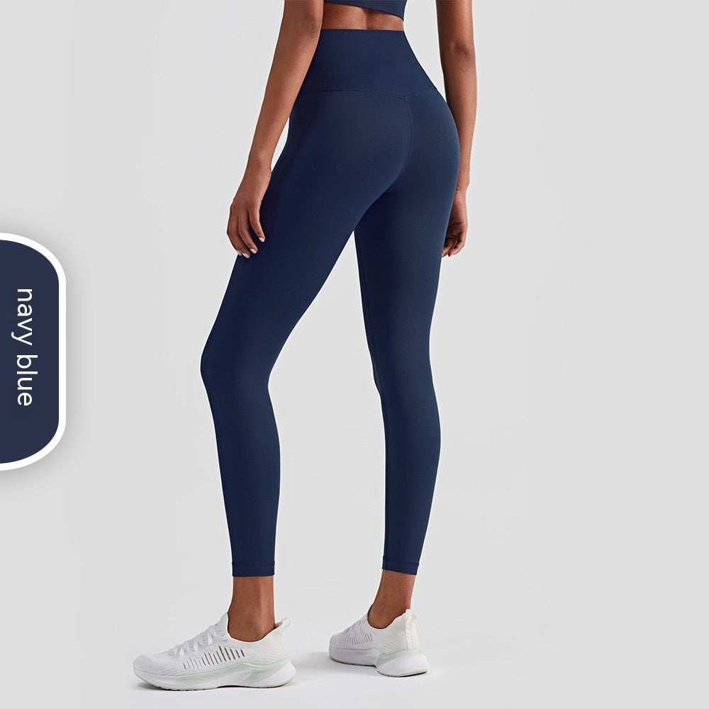 Pantalones de yoga ajustados con realce de cadera en color melocotón para mujer, de moda informal y de color puro